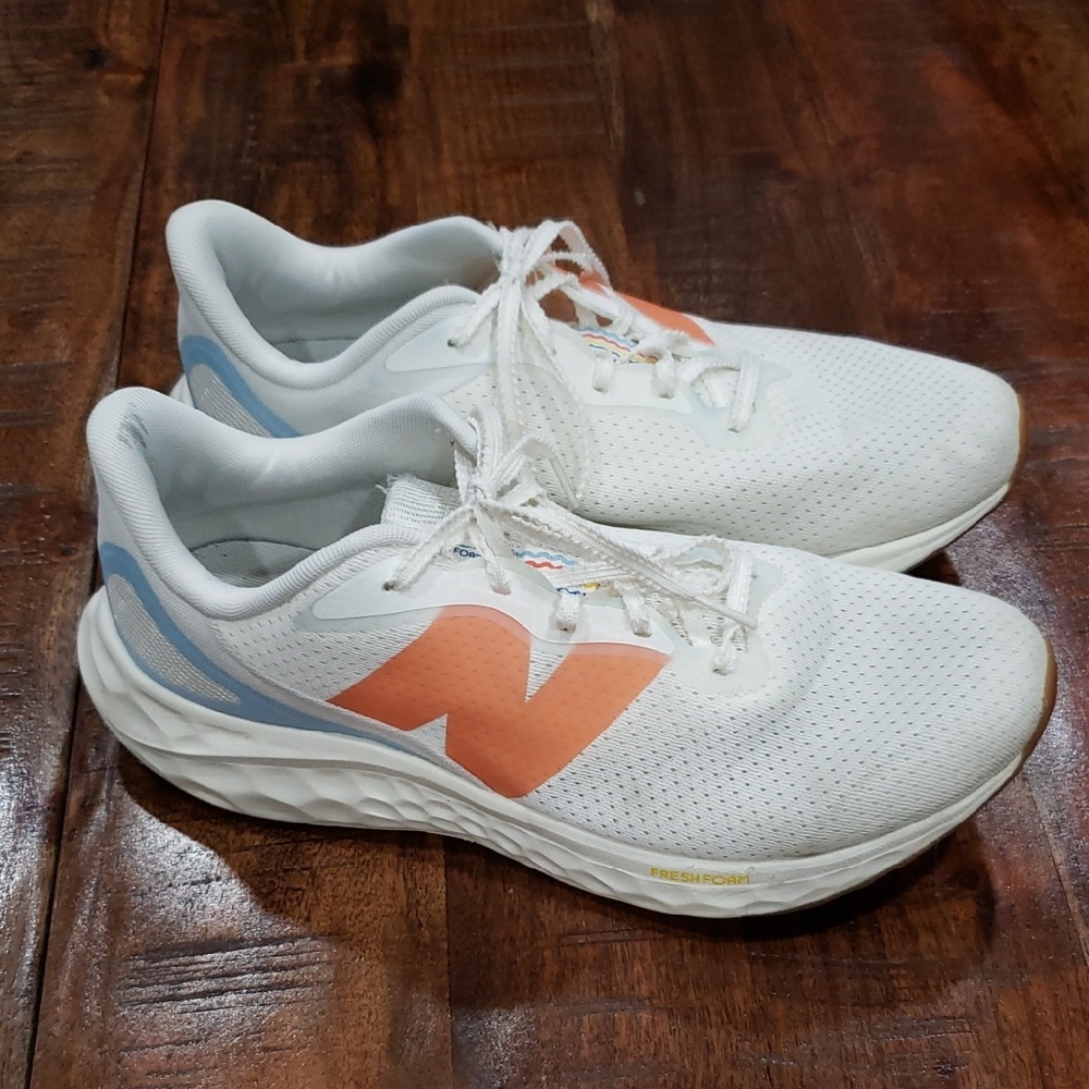 New Balance Cream and Orange Athletic Sneakers with Modern Design